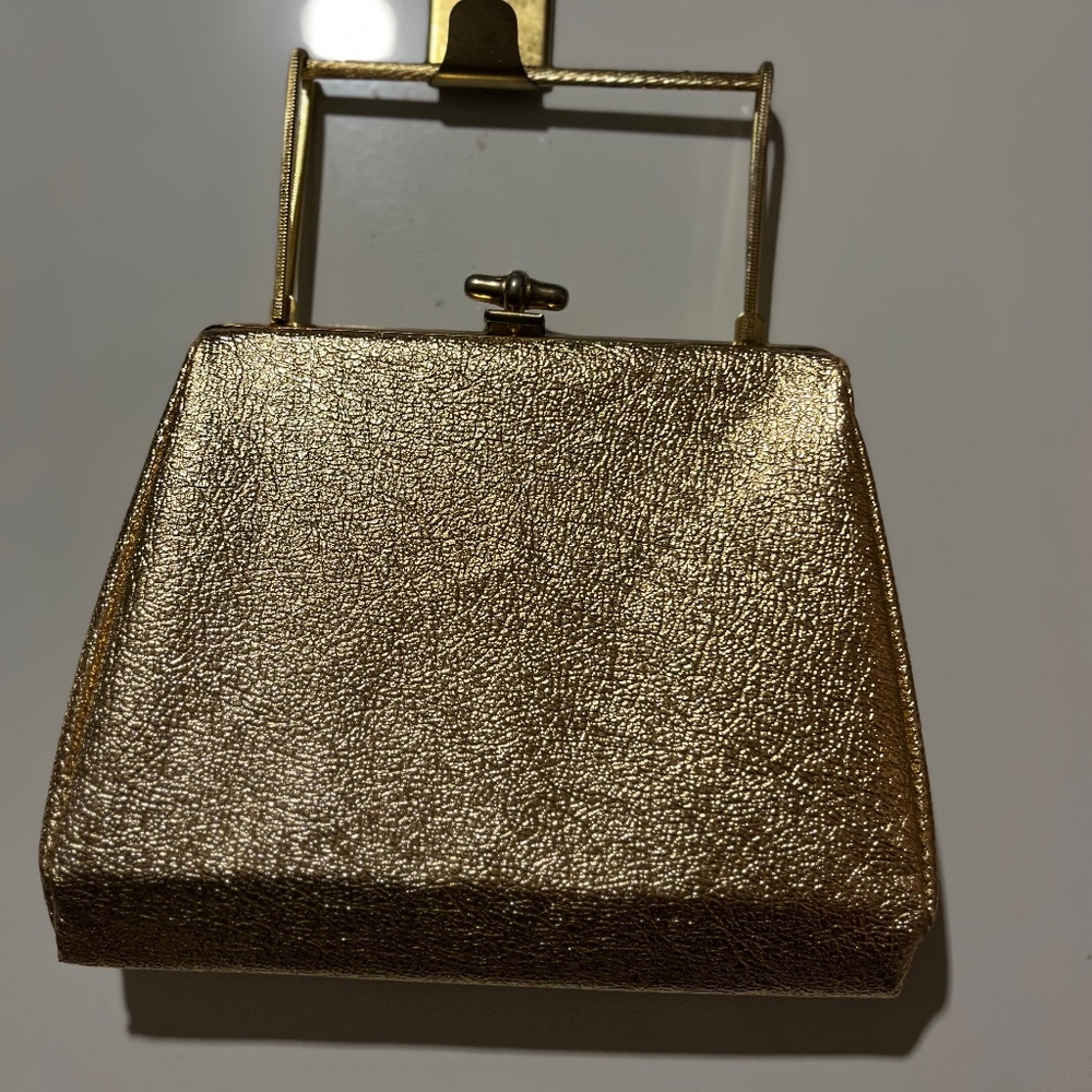 c1950s gold clutch with silk liner